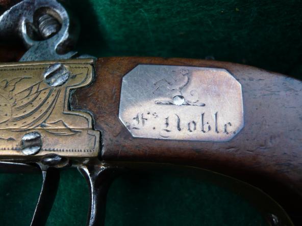 Cased pistols. noblescutcheoncloseup